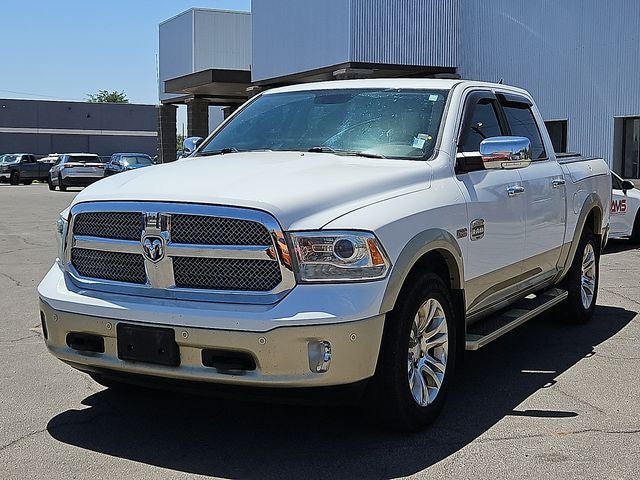 2016 RAM 1500 Laramie Longhorn in Bright White Clearcoat — front three-quarter view