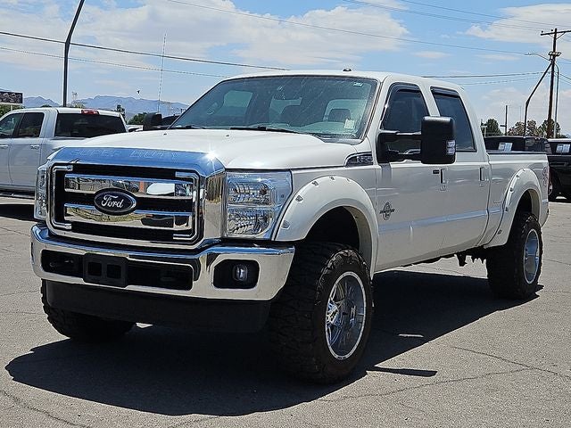 2016 Ford F-250SD Lariat in White Platinum Clearcoat Metallic — front three-quarter view