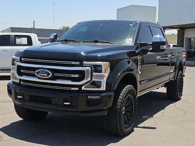 2022 Ford F-250SD Platinum in Black Metallic — front three-quarter view