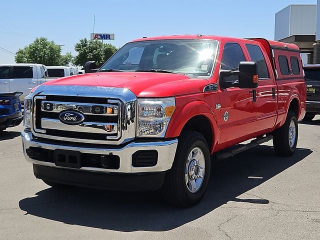 2016 Ford F-350SD XLT in Race Red — front three-quarter view