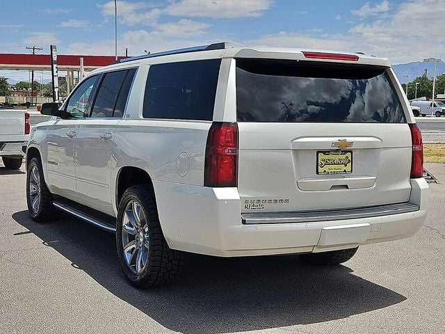 2015 Chevrolet Suburban — rear three-quarter view
